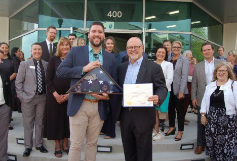 Highlighting the grand opening of the newly rebuilt Woodforest National Bank flagship location in historic downtown Conroe was the presentation of a commemorative United States flag by Craig Lewellyn (left) of Congressman Kevin Brady’s office to Jay Dreibelbis (right), President and CEO of Woodforest National Bank.  Highlighting the grand opening of the newly rebuilt Woodforest National Bank flagship location in historic downtown Conroe was the presentation of a commemorative United States flag by Craig Lewellyn (left) of Congressman Kevin Brady’s office to Jay Dreibelbis (right), President and CEO of Woodforest National Bank.